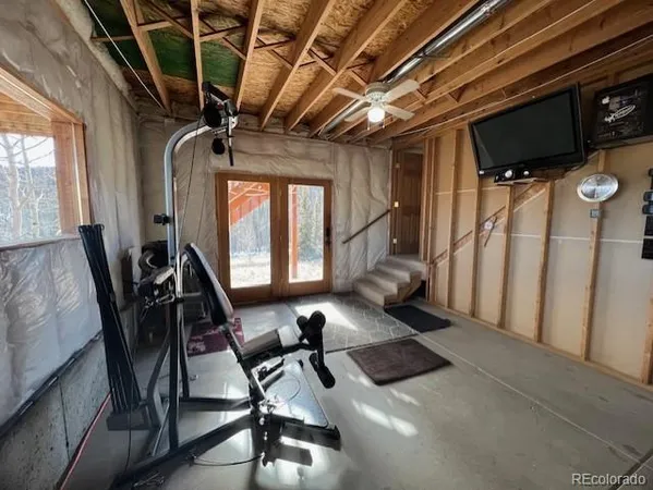 a view of a room with gym equipment