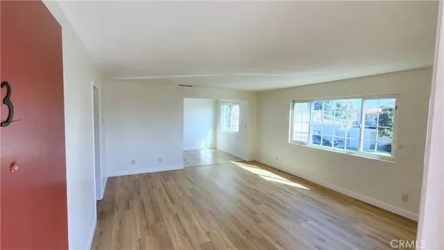 a kitchen with a sink stove and refrigerator