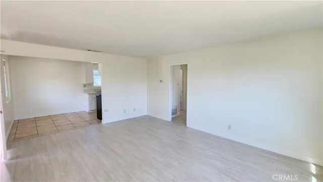 a kitchen with a sink cabinets and window