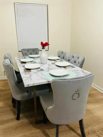 a view of a dining room with furniture