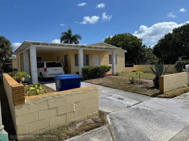 a view of a house with patio