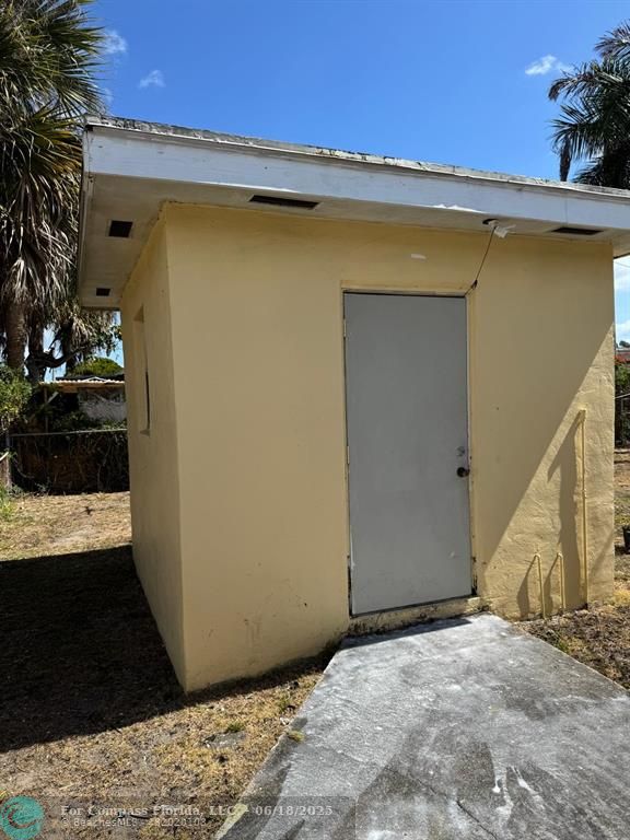 958 West 4th Street Riviera Beach, FL 33404 - Photo 8 of 13 a view of a house with a outdoor space