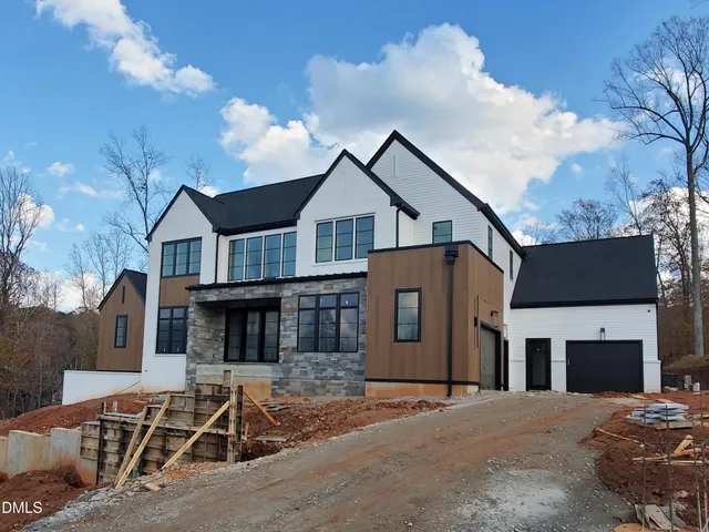 a black and white photo of a living room