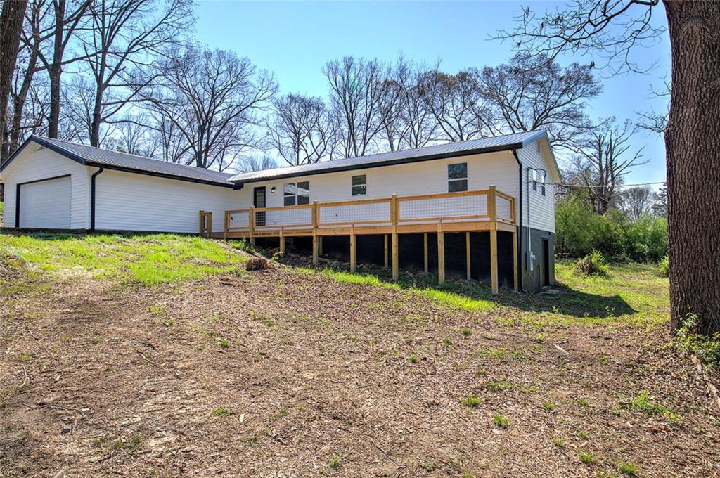 516 Baxter Road Southeast Calhoun, GA 30701 - Photo 41 of 47 a house with trees in the background