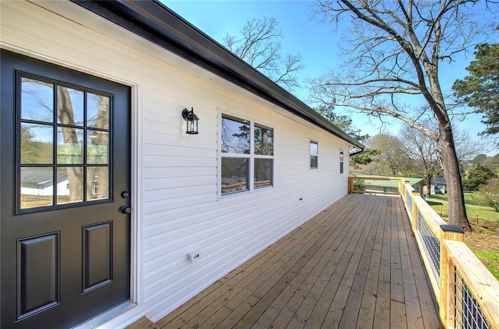 516 Baxter Road Southeast Calhoun, GA 30701 - Photo 5 of 47 a view of a house with a roof deck