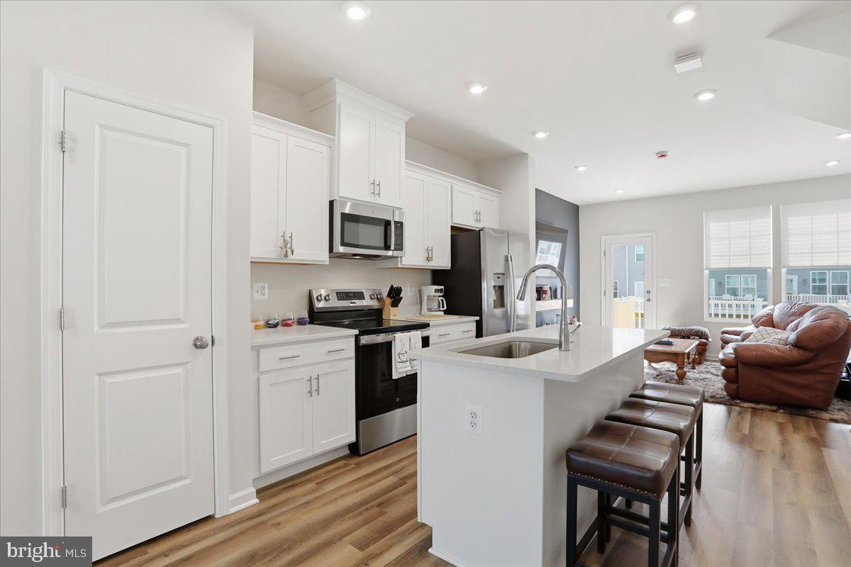 186 Coolidge Avenue Ranson, WV 25438 - Photo 4 of 41 Modern kitchen with sleek finishes.
