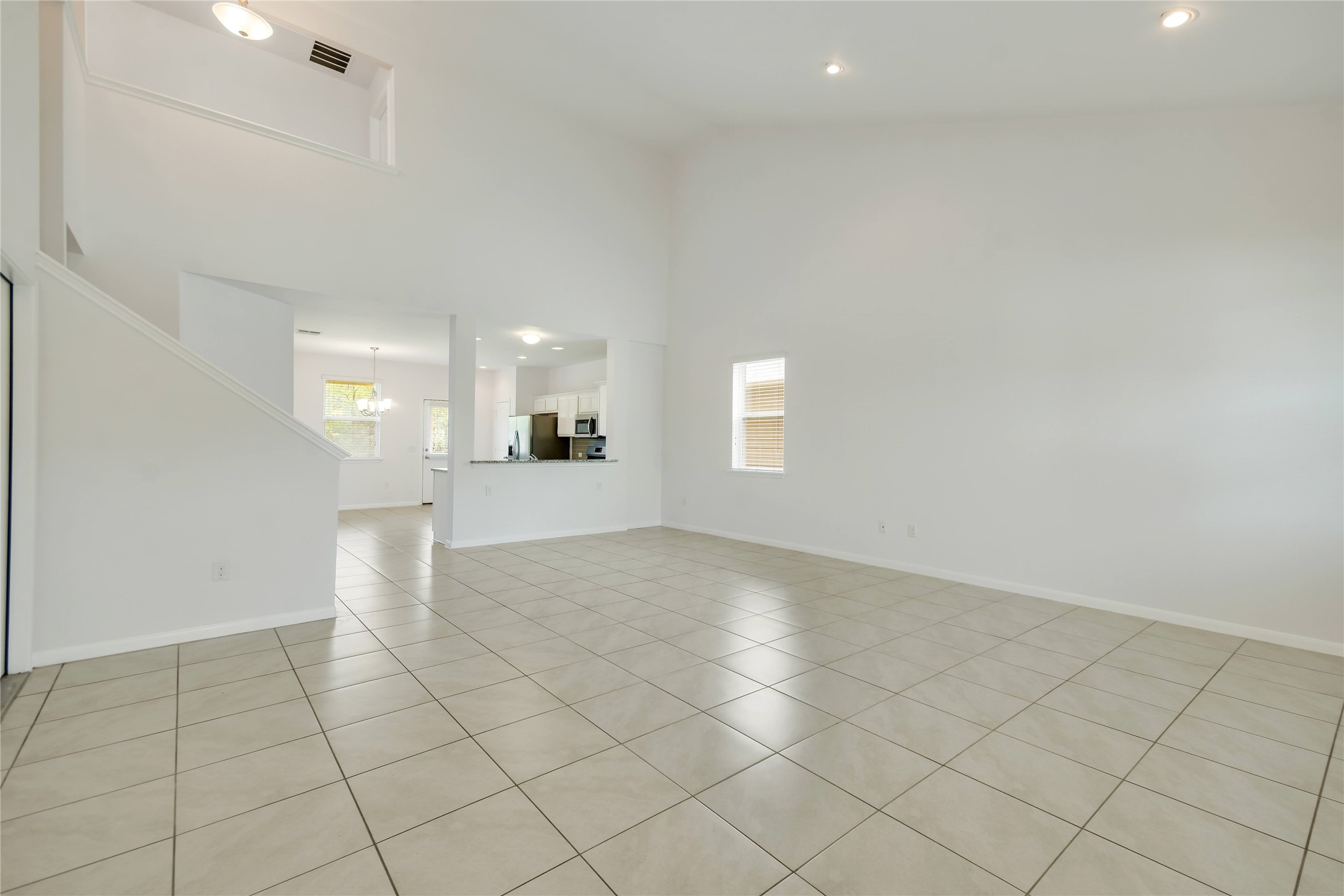 6525 Ranchito Drive Austin, TX 78744 - Photo 6 of 36 Freshly painted bright n airy Living room with high ceiling