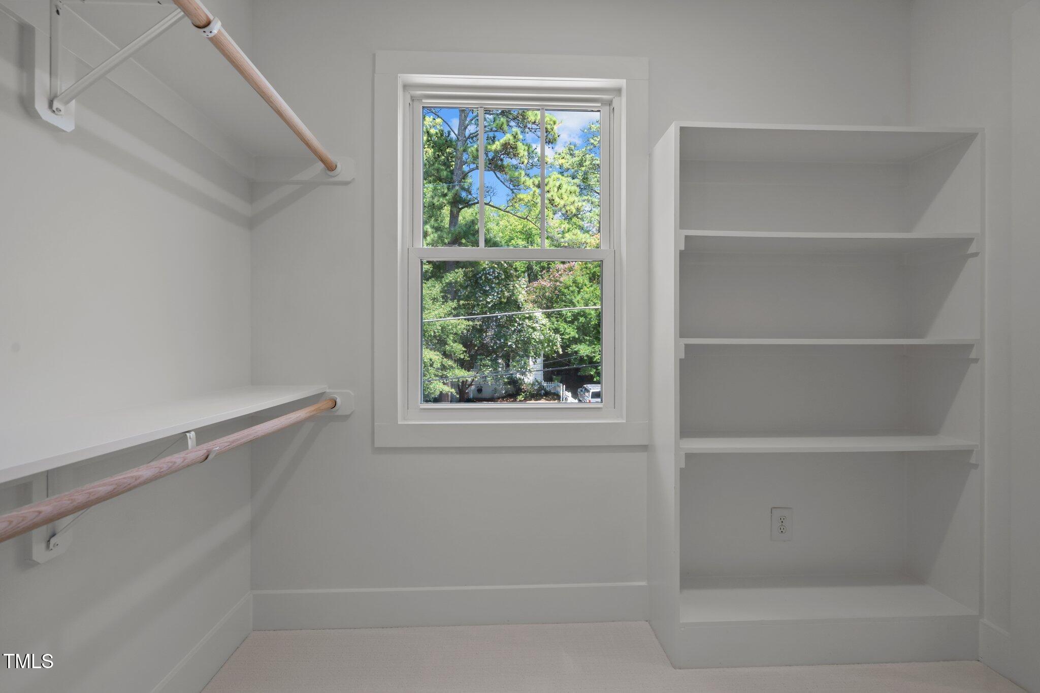 2801 Ashland Street Raleigh, NC 27608 - Photo 31 of 44 a view of an empty room with a window