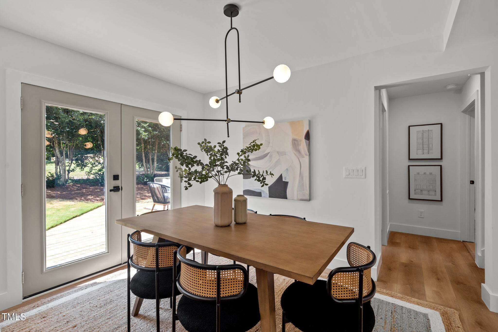 2801 Ashland Street Raleigh, NC 27608 - Photo 10 of 44 a view of a dining room with furniture window and wooden floor