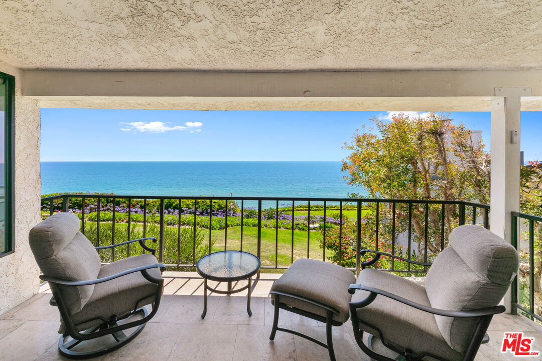 6801 Shearwater Lane Malibu, CA 90265 - Photo 13 of 33 a view of a chairs and table in patio