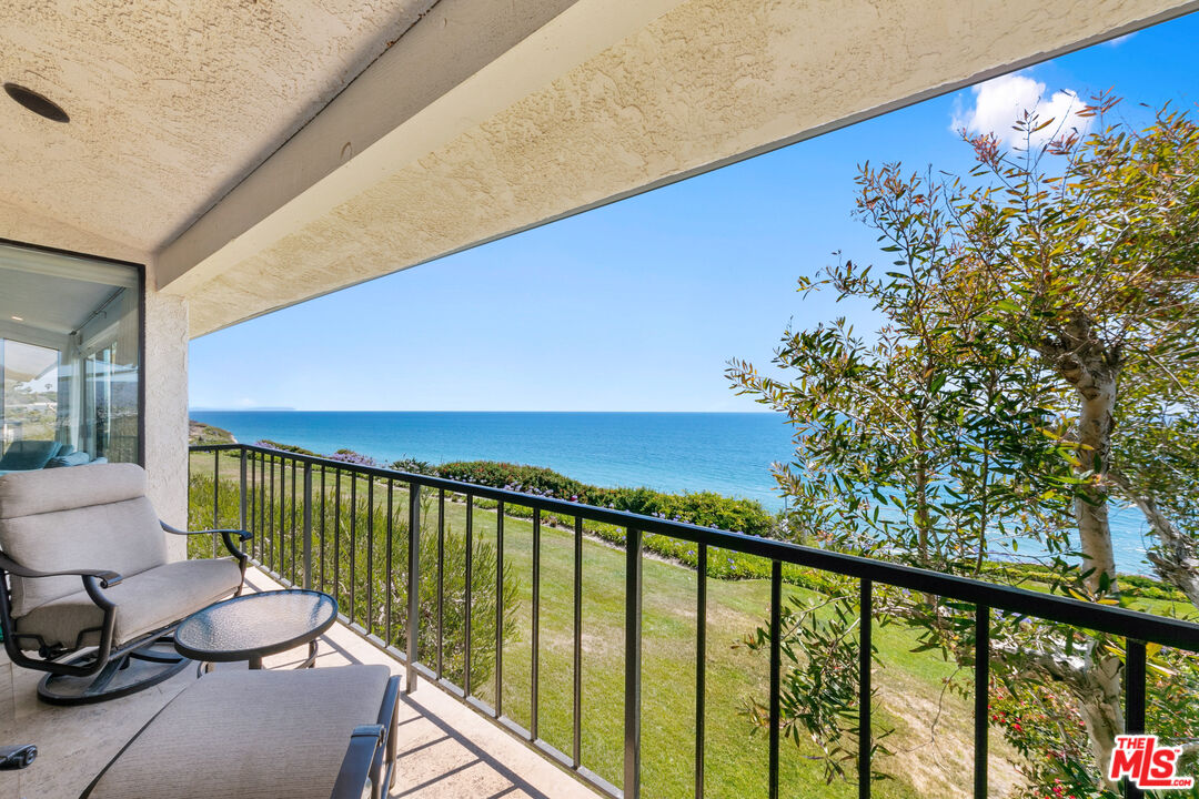 6801 Shearwater Lane Malibu, CA 90265 - Photo 14 of 33 a view of a balcony with furniture