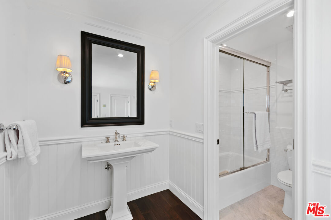 6801 Shearwater Lane Malibu, CA 90265 - Photo 21 of 33 a bathroom with a sink a toilet and shower