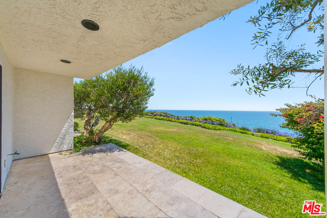 6801 Shearwater Lane Malibu, CA 90265 - Photo 22 of 33 a view of an outdoor space and a yard
