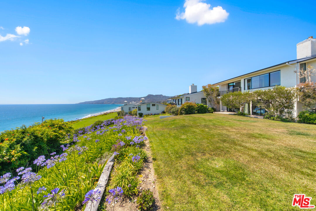 6801 Shearwater Lane Malibu, CA 90265 - Photo 23 of 33 a view of a house with a yard