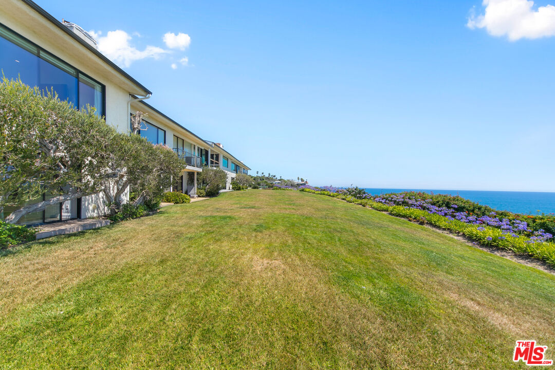 6801 Shearwater Lane Malibu, CA 90265 - Photo 24 of 33 a view of an ocean and a balcony