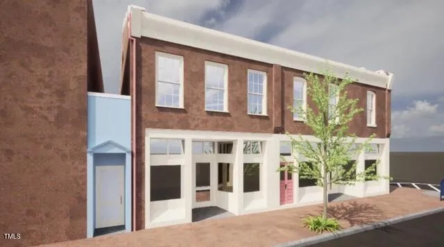 a view of a brick house with a large window