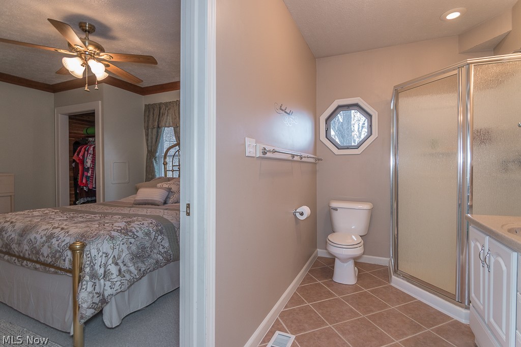 2350 Dock Road Madison, OH 44057 - Photo 14 of 29 1st floor updated master bathroom with shower.