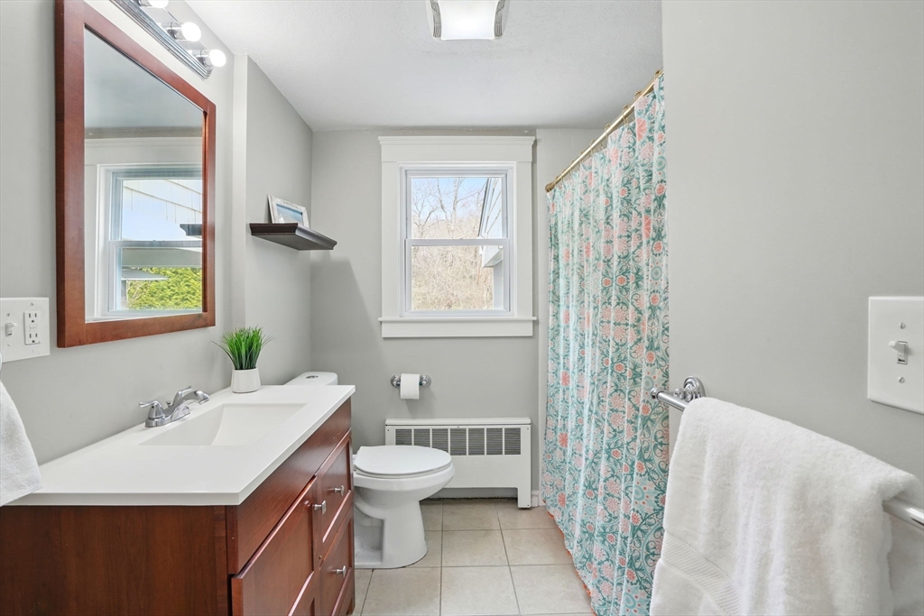 11 Old Oaken Bucket Road Norwell, MA 02061 - Photo 15 of 39 a bathroom with a sink a toilet and shower