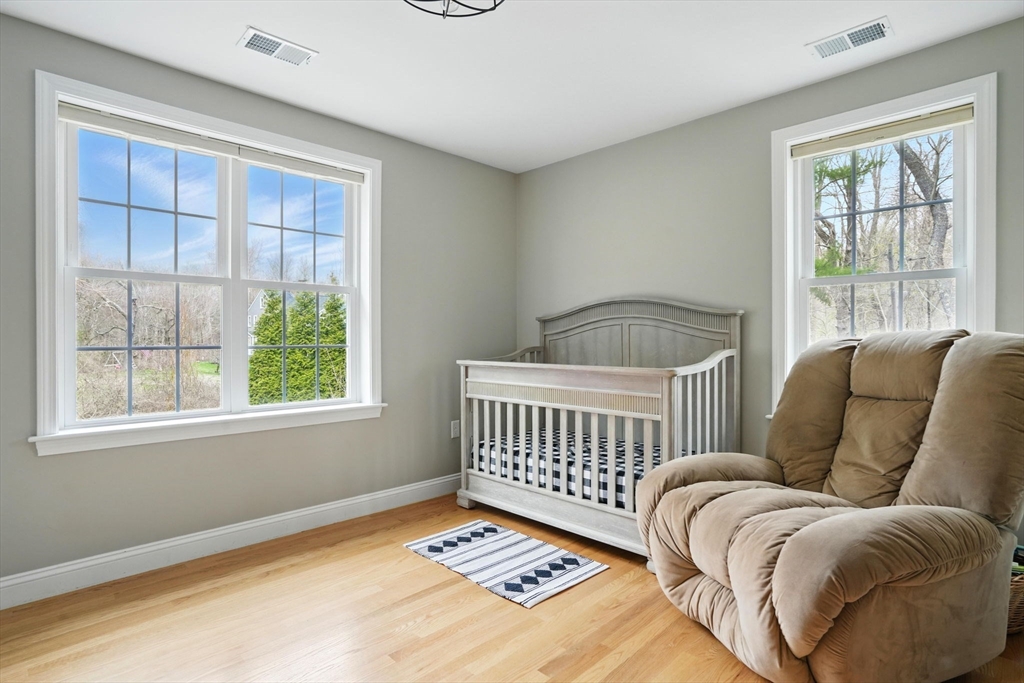 11 Old Oaken Bucket Road Norwell, MA 02061 - Photo 20 of 39 a bedroom with furniture and a window