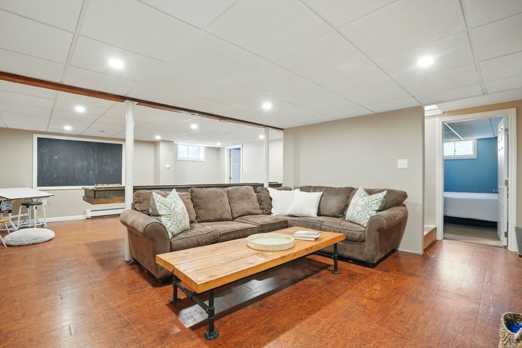 11 Old Oaken Bucket Road Norwell, MA 02061 - Photo 26 of 39 a living room with furniture and a view of kitchen