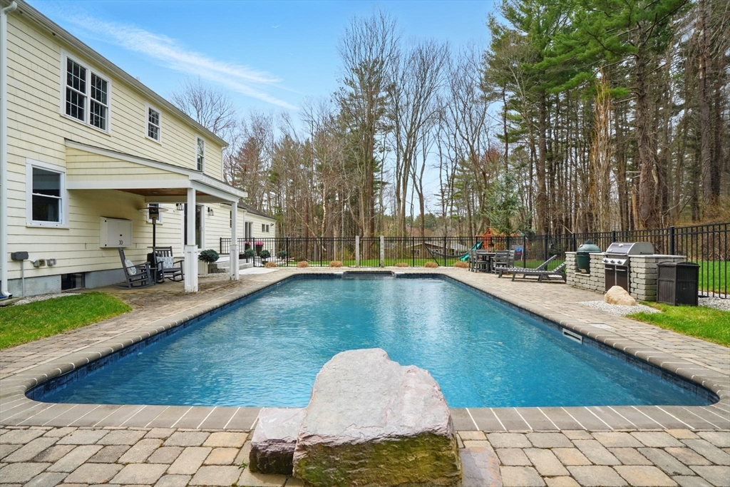11 Old Oaken Bucket Road Norwell, MA 02061 - Photo 33 of 39 a view of a swimming pool with a patio