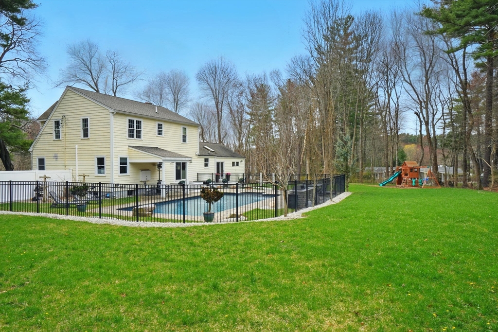 11 Old Oaken Bucket Road Norwell, MA 02061 - Photo 38 of 39 a view of a house with a yard and sitting area