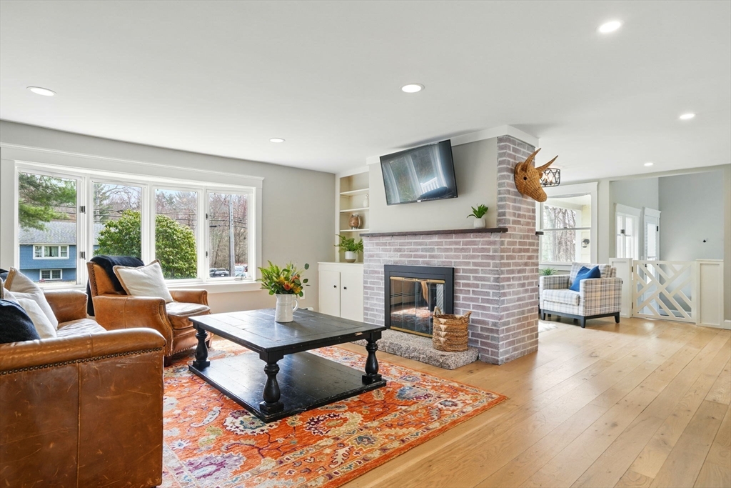 11 Old Oaken Bucket Road Norwell, MA 02061 - Photo 7 of 39 a living room with furniture and a fireplace