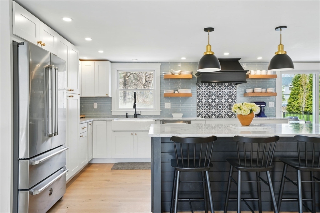 11 Old Oaken Bucket Road Norwell, MA 02061 - Photo 10 of 39 a kitchen with stainless steel appliances a sink stove and refrigerator