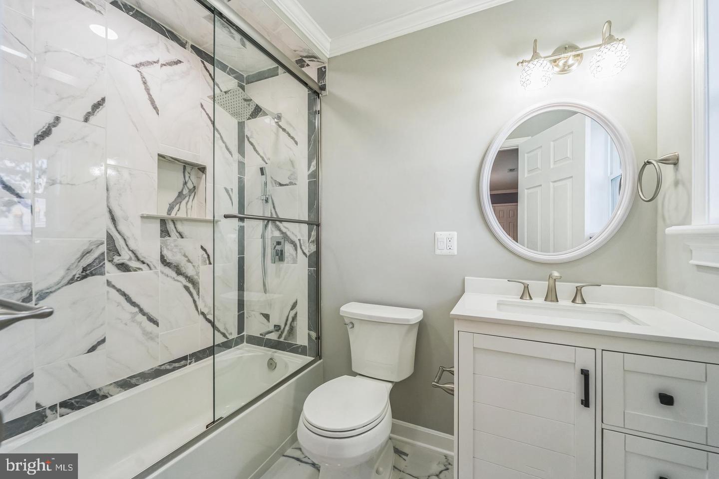 1123 Odenton Road Odenton, MD 21113 - Photo 15 of 22 a bathroom with a sink toilet and shower