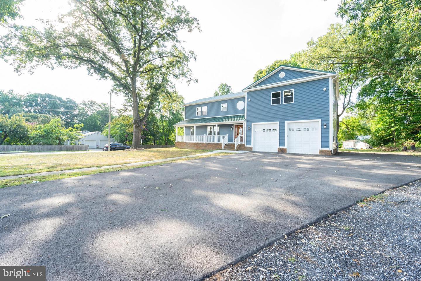 1123 Odenton Road Odenton, MD 21113 - Photo 2 of 22 a view of the house with a swimming pool