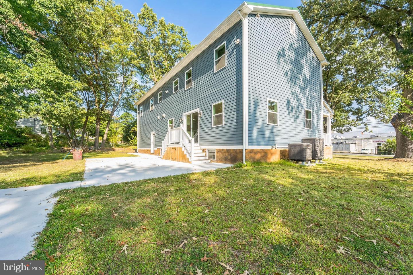 1123 Odenton Road Odenton, MD 21113 - Photo 3 of 22 a view of a house with a backyard