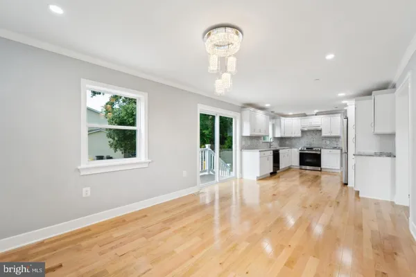 a view of kitchen with furniture and window