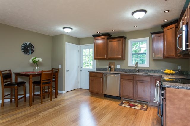 292 East Riverside Drive Timberville, VA 22853 - Photo 4 of 29 Brand new kitchen, granite counters, bamboo flooring, fixtures, lighting, and paint!