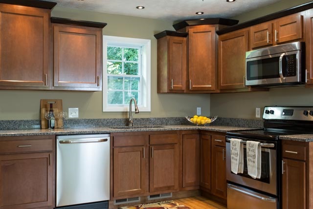 292 East Riverside Drive Timberville, VA 22853 - Photo 5 of 29 Stainless steel appliances and granite counters, plus a window above the kitchen sink.