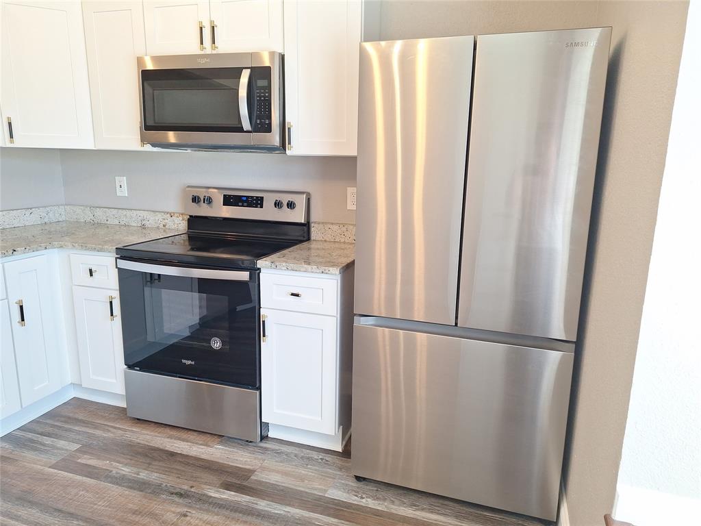 108 Kings Row Garland, TX 75043 - Photo 7 of 21 Includes Refrigerator