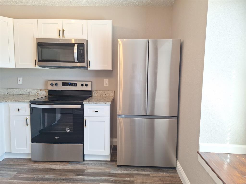 108 Kings Row Garland, TX 75043 - Photo 9 of 21 Includes Refrigerator