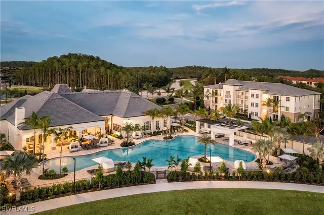 an aerial view of residential houses and outdoor space