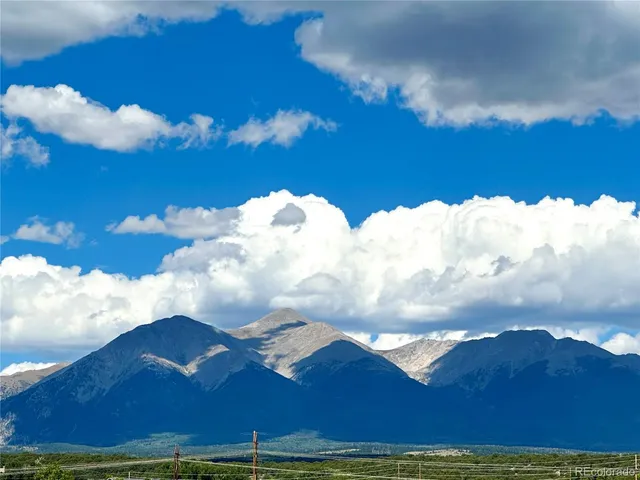 a view of a golf course with a lake