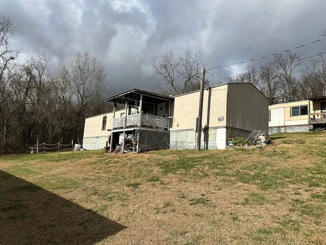 a big room with an outdoor space and seating area