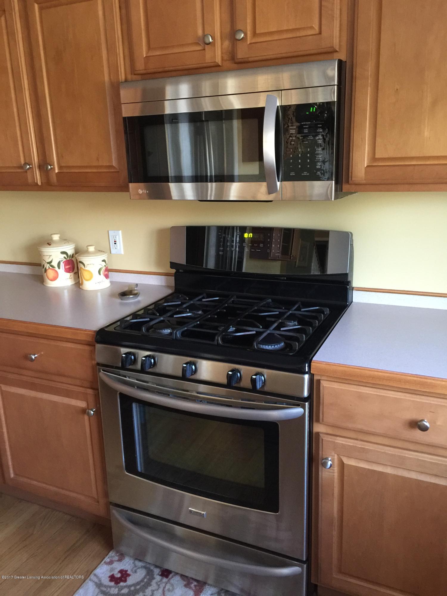 3320 Hidden Ridge Drive Dewitt, MI 48820 - Photo 10 of 38 Stove and Microwave