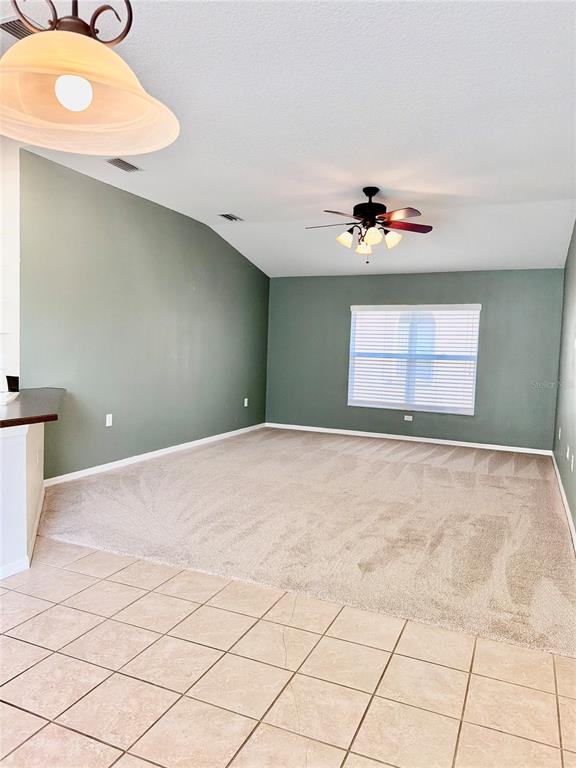 31224 Crestmont Court Wesley Chapel, FL 33543 - Photo 26 of 36 a view of an empty room with a window