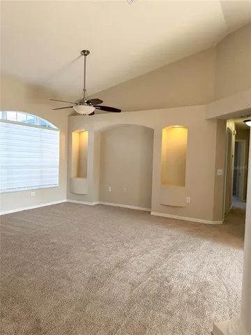 a view of a livingroom with a staircase