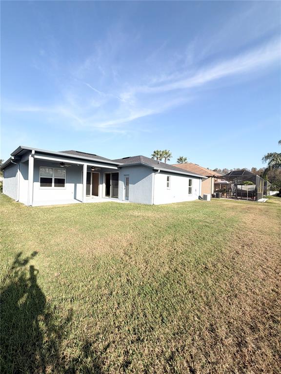 31224 Crestmont Court Wesley Chapel, FL 33543 - Photo 34 of 36 a big yard with large trees