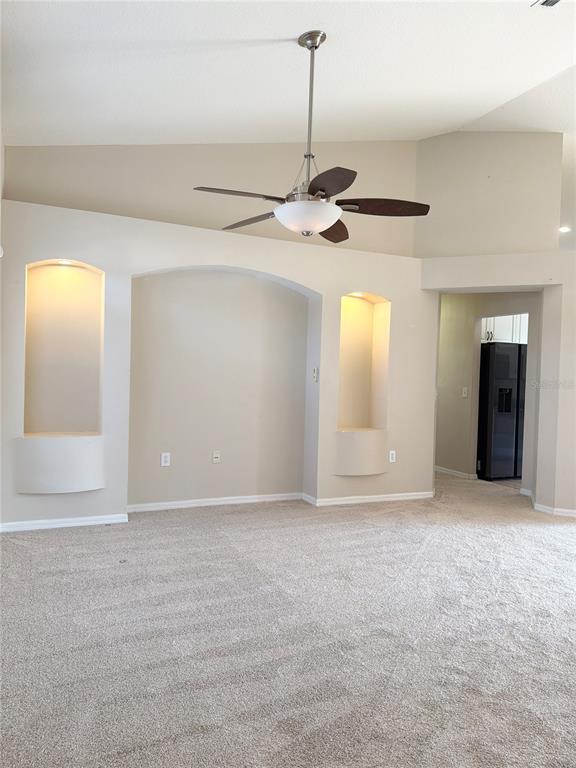 31224 Crestmont Court Wesley Chapel, FL 33543 - Photo 7 of 36 a view of an empty room with a window