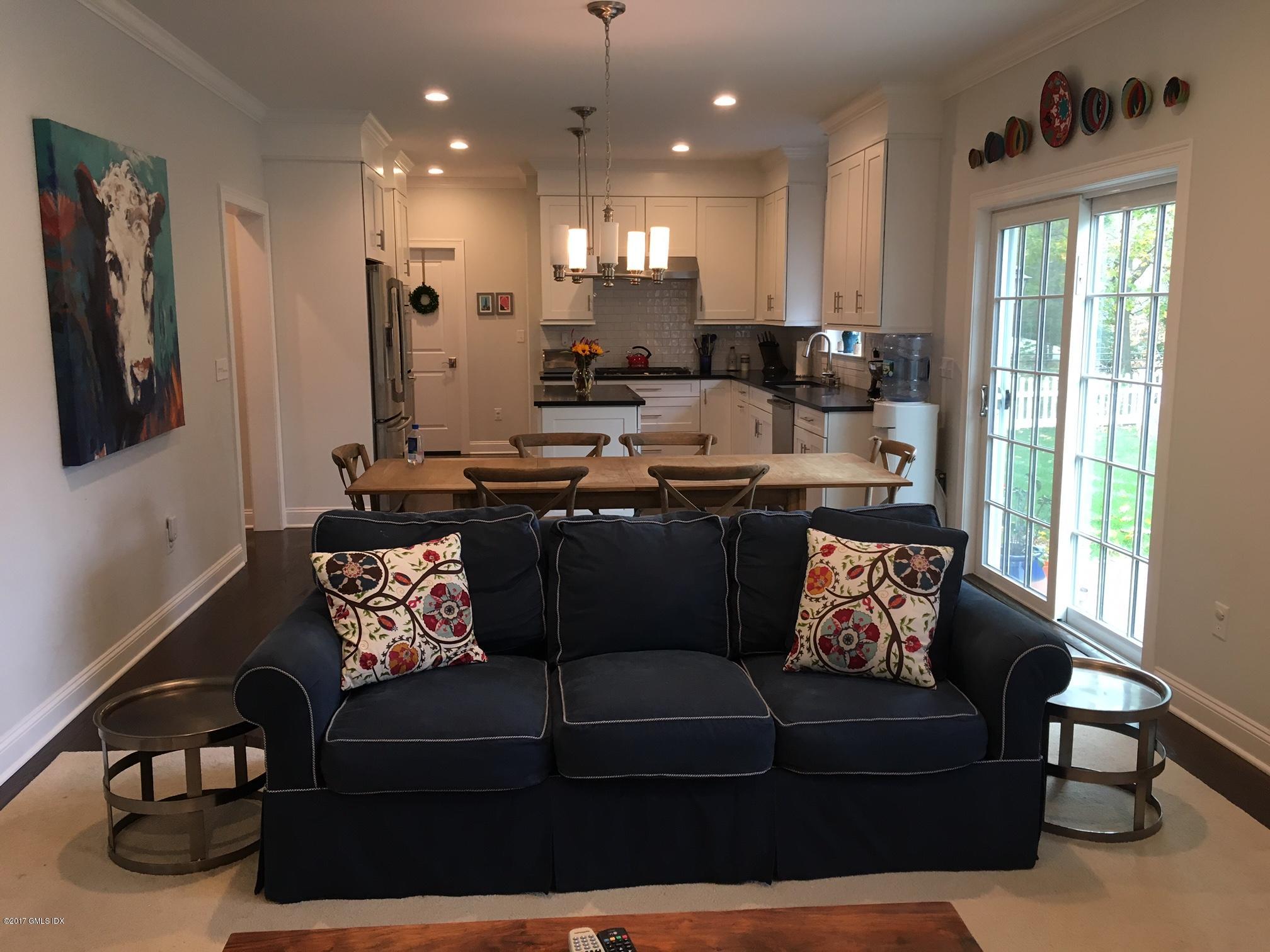551 River Road Cos Cob, CT 06870 - Photo 14 of 40 a living room with furniture kitchen area and a window