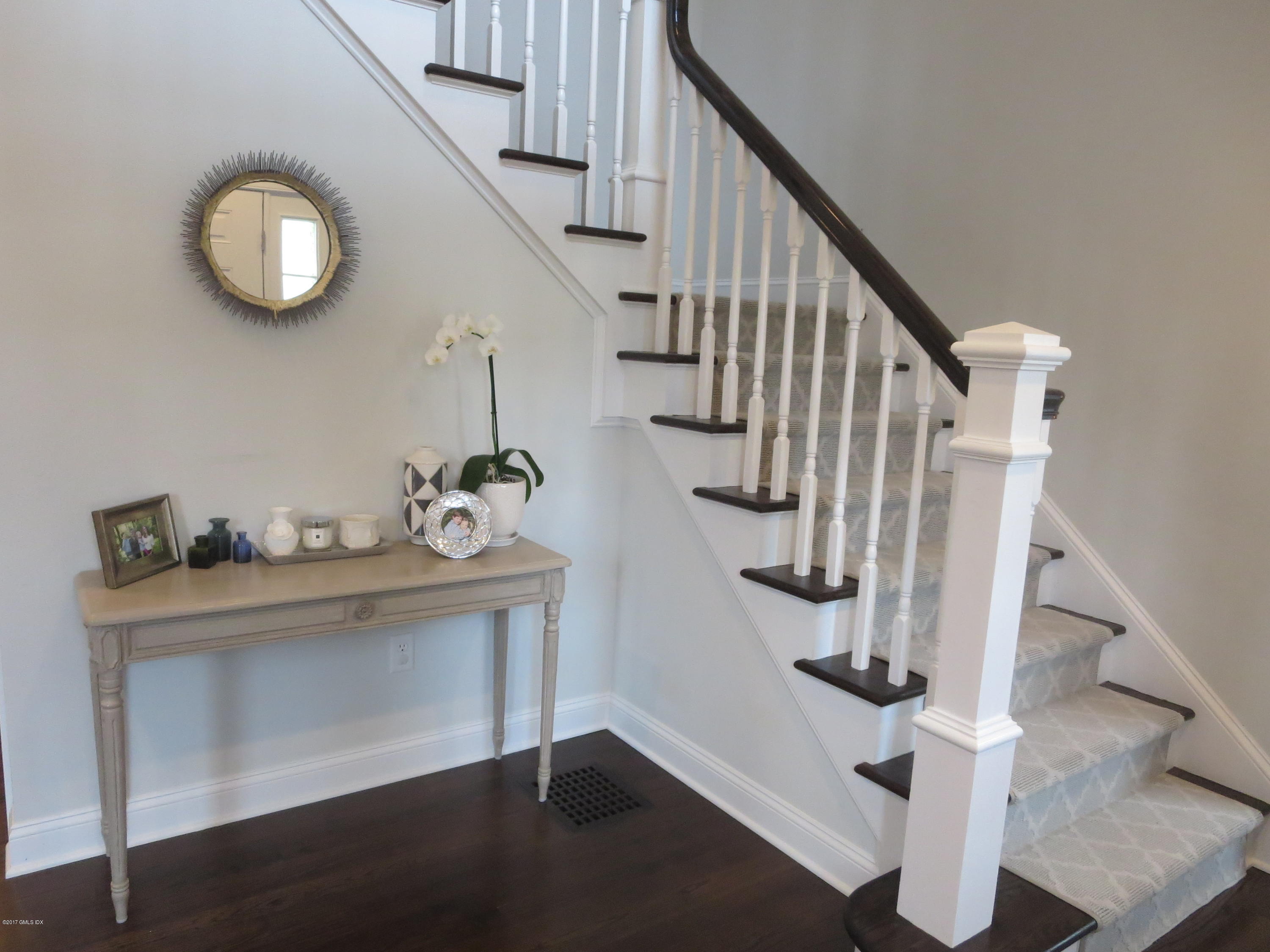 551 River Road Cos Cob, CT 06870 - Photo 2 of 40 a view of entryway with wooden floor