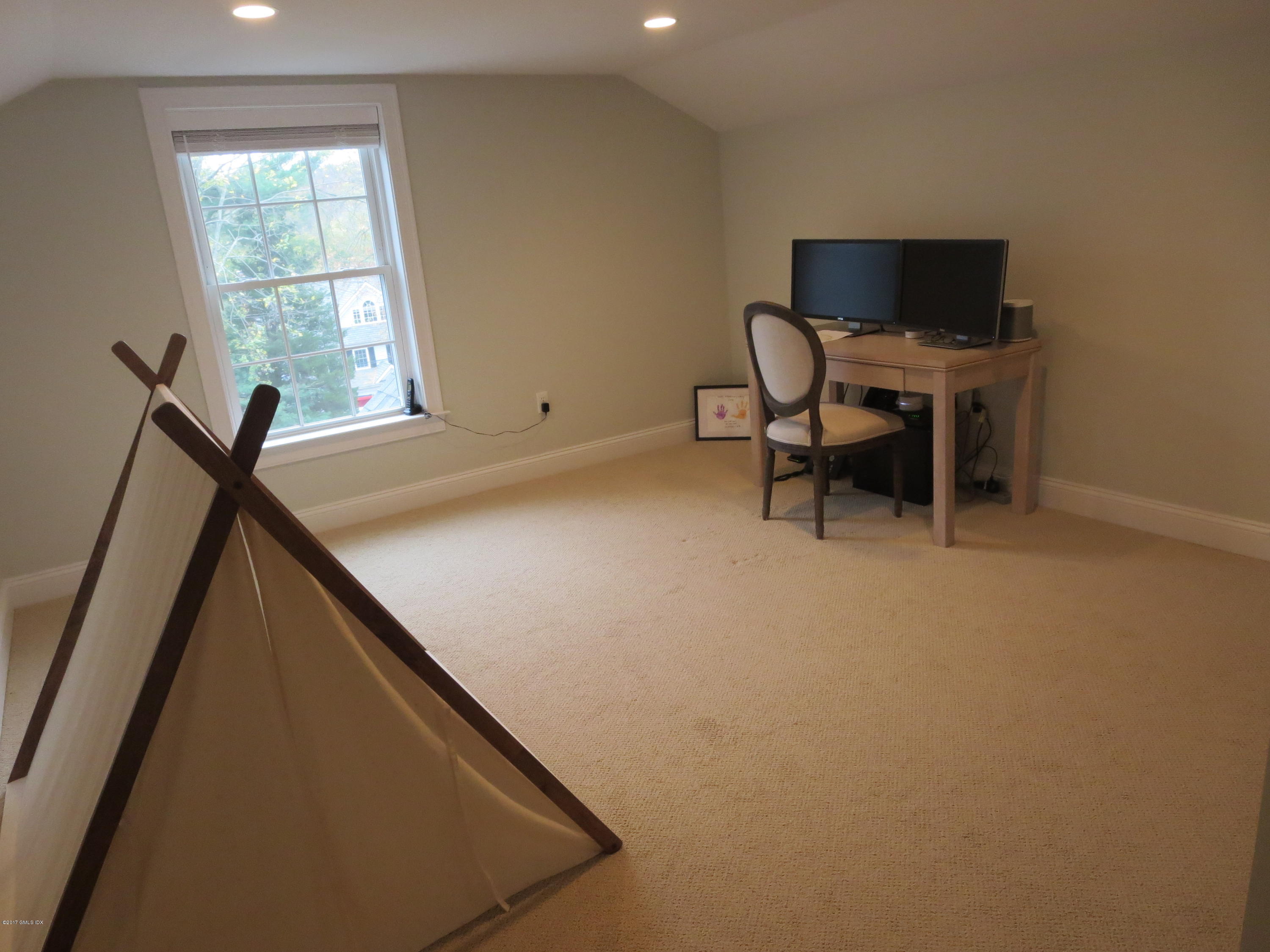 551 River Road Cos Cob, CT 06870 - Photo 28 of 40 a view of a workspace with furniture and a window