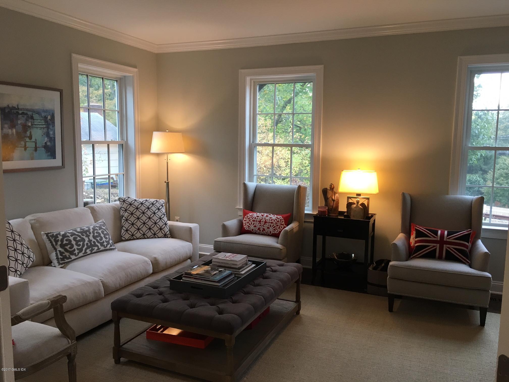 551 River Road Cos Cob, CT 06870 - Photo 3 of 40 a living room with furniture and a window