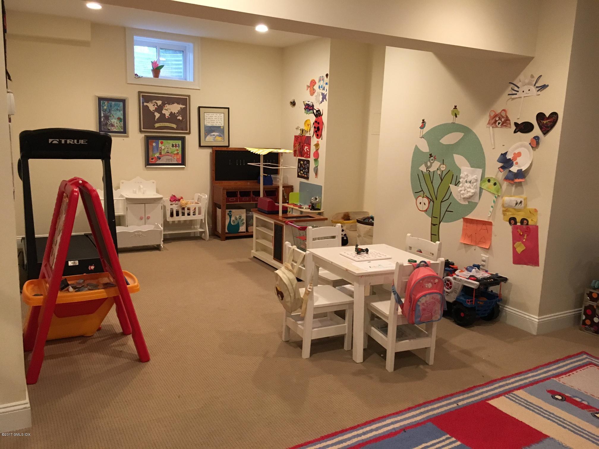 551 River Road Cos Cob, CT 06870 - Photo 33 of 40 a dining room with furniture and rug