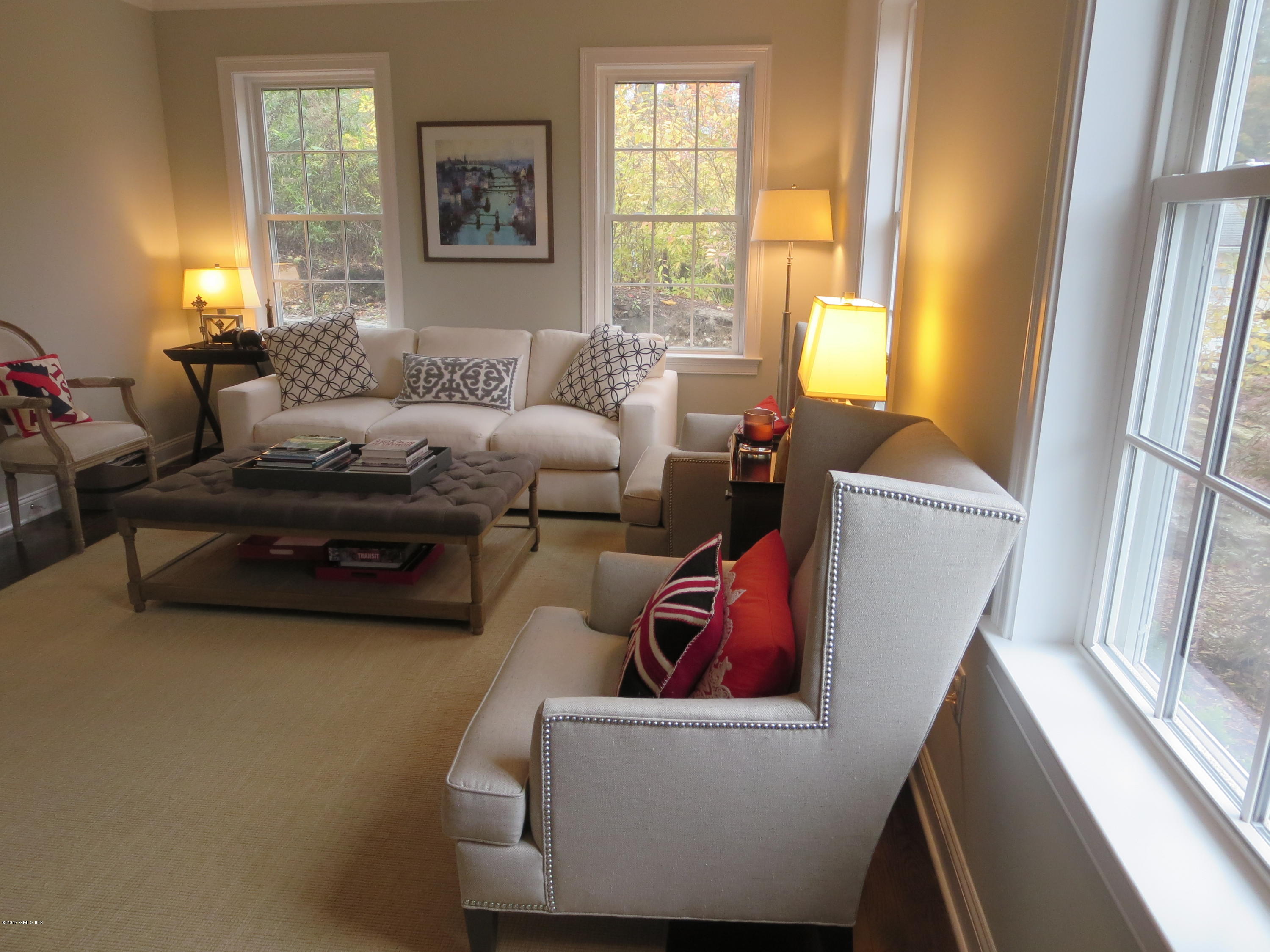 551 River Road Cos Cob, CT 06870 - Photo 4 of 40 a living room with furniture and a window